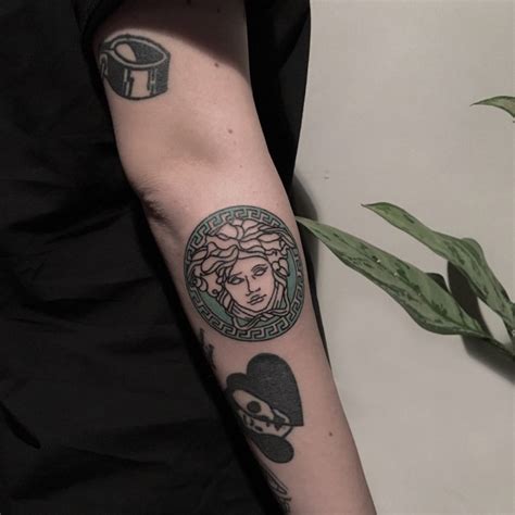 versace tattoos.